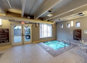 Thumbnail 10 of 18 - Indoor Hot Tub and Circular Table
