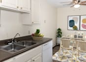 Thumbnail 5 of 23 - the preserve at ballantyne commons apartment kitchen and dining area