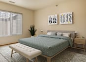 Thumbnail 5 of 20 - a bedroom with a bed and a dresser and a window