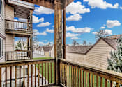 Thumbnail 11 of 20 - the view from the deck of a home with a porch