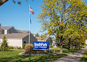 Thumbnail 29 of 29 - Exterior SouthFork Entrance with Sign and Flagpole