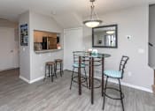 Thumbnail 6 of 29 - Detached Dining Room with Tall Table and Chairs
