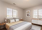 Thumbnail 6 of 12 - Spacious bedroom with two large windows brightening the space.