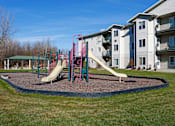 Thumbnail 30 of 34 - Outdoor playground next to the outdoor picnic area.