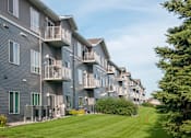 Thumbnail 13 of 15 - Exterior The Gardens Apartments Balconies