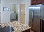 Thumbnail 4 of 15 - In Unit Washer Dryer in Room Next to Kitchen
