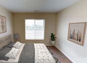 Thumbnail 6 of 15 - Bedroom with Natural Light, Bed and Nightstands