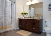 Thumbnail 8 of 15 - Bathroom with Granite Counters, Toilet and Shower