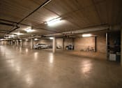 Thumbnail 7 of 9 - Well Lit Underground Garage with Parked Cars