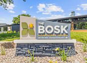 Thumbnail 29 of 31 - Property Signage at The Bosk Apartment Homes, Woodbury, MN, 55125
