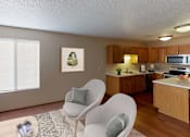 Thumbnail 9 of 12 - Living room with white rug and matching chairs
