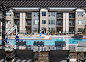 Thumbnail 13 of 24 - Large Table under Pergola on Outdoor Pool Sundeck