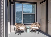 Thumbnail 12 of 24 - Private Patio with Chairs and Door