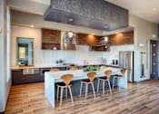Thumbnail 21 of 24 - Community Room with Full Kitchen and Large Table