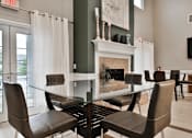 Thumbnail 9 of 18 - Glass Table and Decorative Fireplace