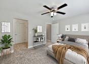 Thumbnail 5 of 18 - Bedroom with Bed and Fan