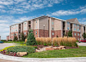 Thumbnail 17 of 18 - Exterior Whispering Ridge with Decorative Plants