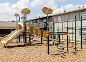 Thumbnail 20 of 32 - Outdoor Playground at La Bella Apartments, Fort Worth, 76116