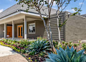 Thumbnail 23 of 32 - Leasing Office Exterior at La Bella Apartments, Fort Worth, TX