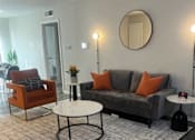 Thumbnail 3 of 32 - Model Living Room at La Bella Apartments, Fort Worth