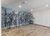 Thumbnail 24 of 35 - a room with many bikes hanging on the wall at City View St. George Apartments, St George, UT, 84770
