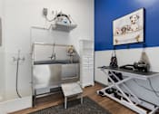 Thumbnail 23 of 35 - a small room with a sink and a table and a refrigerator at City View St. George Apartments, Utah