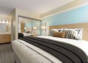 Thumbnail 107 of 108 - a hotel room with a bed and a bathroom