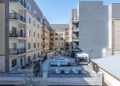 Thumbnail 8 of 84 - a view of an apartment complex with a pool in the middle at The Revival, Salt Lake City, UT