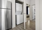 Thumbnail 43 of 83 - a room with a washer and dryer in it at 200 City View, Utah