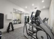 Thumbnail 40 of 83 - a gym with cardio equipment and weights at 200 City View, Provo, Utah