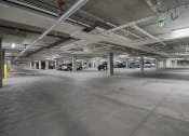 Thumbnail 29 of 83 - a parking garage with cars in it at 200 City View, Utah, 84601