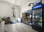 Thumbnail 38 of 83 - a pepsi store with a wooden floor and a chandelier hanging from the ceiling at 200 City View, Utah