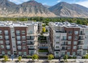 Thumbnail 3 of 83 - an aerial view of an apartment building with mountains in the background at 200 City View, Provo, UT, 84601