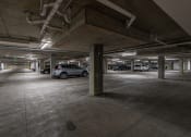 Thumbnail 30 of 83 - an empty parking garage with cars parked in it at 200 City View, Provo