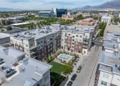 Thumbnail 6 of 83 - an aerial view of a city with a pool and buildings at 200 City View, Provo