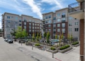 Thumbnail 9 of 83 - an empty parking lot in front of an apartment building at 200 City View, Provo, UT