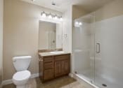 Thumbnail 22 of 46 - a bathroom with a toilet sink and shower at Siena Villas Apartments, Orem