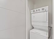 Thumbnail 94 of 131 - A white dishwasher is installed in a kitchen.