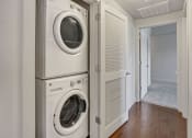 Thumbnail 5 of 71 - a washer and dryer in a laundry room at Wilmington Flats Apartments, Salt Lake City