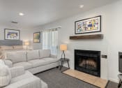 Thumbnail 29 of 50 - a living room filled with furniture and a fire place
