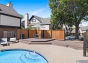 Thumbnail 17 of 50 - a backyard with a pool and a privacy fence with a house in the background