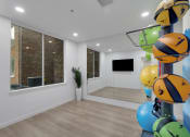 Thumbnail 18 of 51 - the living room is decorated with colorful balls and a large window