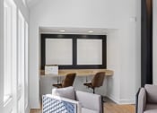 Thumbnail 10 of 56 - a room with a desk and two chairs