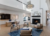 Thumbnail 12 of 56 - a living room filled with furniture and a fire place