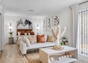 Thumbnail 1 of 61 - a living room with a couch and a bed at AVIA Lofts on Liberty Ridge, Jacksonville, FL, 32256