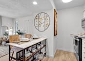 Thumbnail 4 of 61 - our spacious kitchen and dining room are open to the living room and family room at AVIA Lofts on Liberty Ridge, Florida