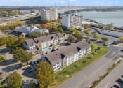 Thumbnail 31 of 45 - an aerial view of houses and a river and a bridge