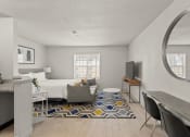 Thumbnail 13 of 45 - a bedroom with a bed and a desk and a living room