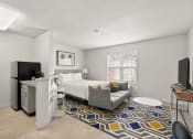 Thumbnail 6 of 45 - a studio apartment with a bed and a couch and a tv