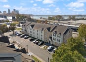 Thumbnail 29 of 45 - an aerial view of an apartment complex with a river in the background